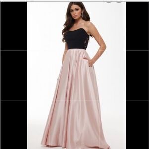 Blondie Nites - Black and Pink Prom/ padgeant Gown with pockets.
Used once
